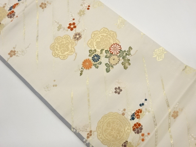 Nagoya obi with woven openwork in a design of flowers and plants (framed tailori
